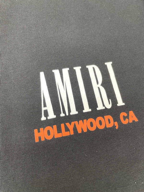 Three-quarter angle view of Amiri luxury piece style No.064