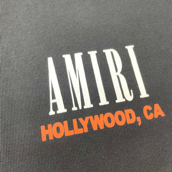 Three-quarter angle view of Amiri luxury piece style No.064