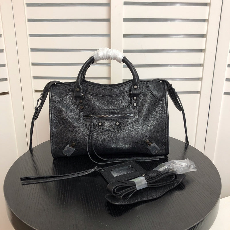 Front view of structured polished women's handbag – women's luxury handbag