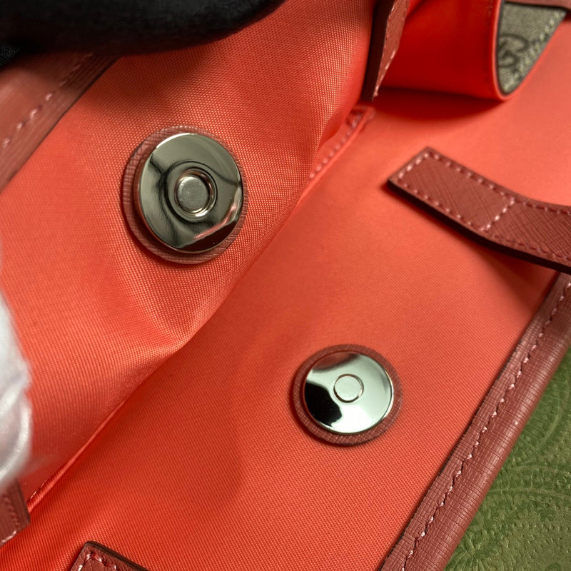 Side profile of classic everyday-luxe women's handbag – women's statement bag