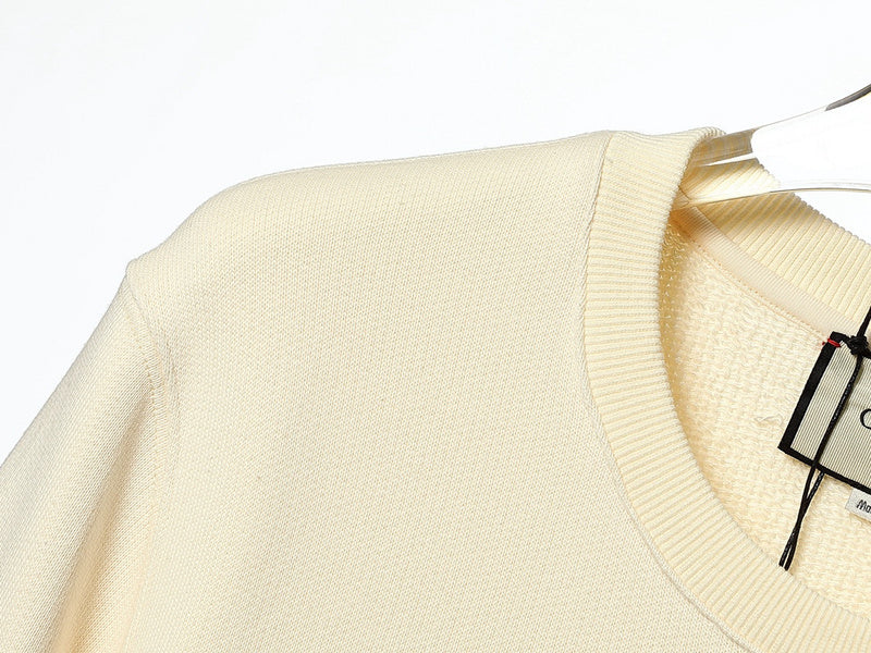 Front view of Gucci luxury clothing with tailored silhouette
