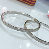 Close-up detail view of Cartier unisex jewelry piece