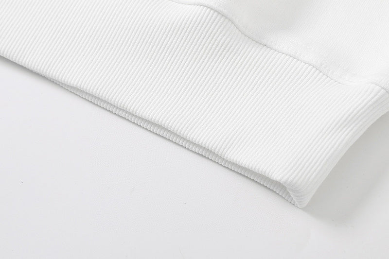 Side profile of Louis Vuitton luxury clothing with signature branding