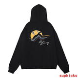 Side profile of Rhude luxury clothing with signature branding