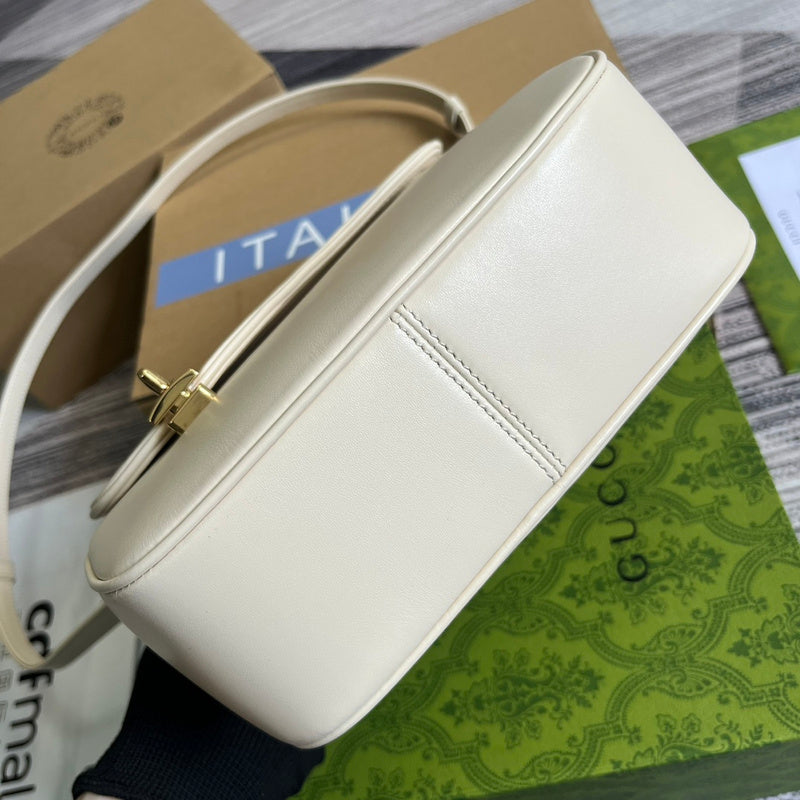 Styled lifestyle shot of classic elevated women's handbag – women's luxury handbag