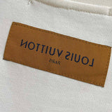 Side profile of Louis Vuitton luxury clothing with tailored silhouette