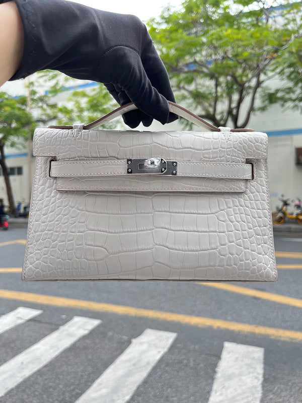 Side view of polished structured handbag