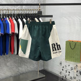 Side profile of Rhude luxury clothing with streetwear-inspired cut