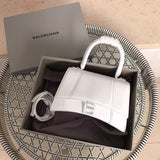 Front view of premium refined women's handbag – women's statement bag