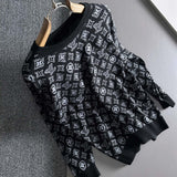Front view of Louis Vuitton luxury clothing with logo-detail design