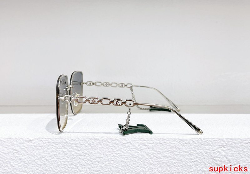Close-up detail view of Louis Vuitton unisex sunglasses