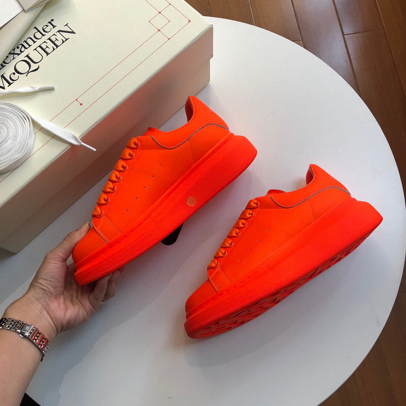 Alexander McQueen bold contrast luxury sneakers view 4 sleek tonal finish
