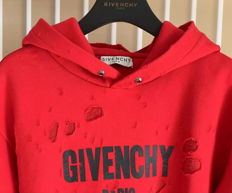 Flat lay presentation of Givenchy luxury clothing with logo-detail design