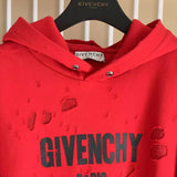 Flat lay presentation of Givenchy luxury clothing with logo-detail design