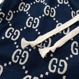 Back view of Gucci luxury clothing with monogram-inspired silhouette