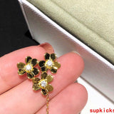 Angled view of Van Cleef & Arpels unisex jewelry piece