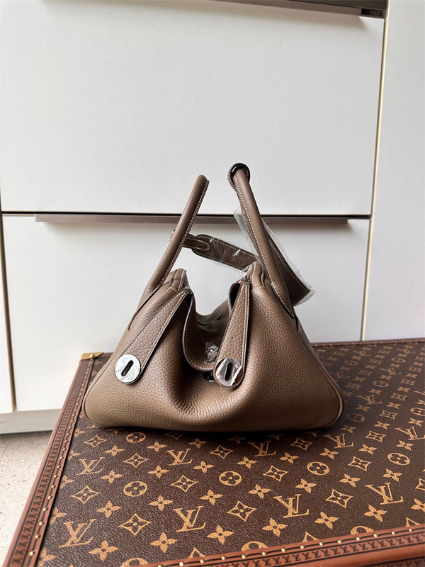  graceful top-handle bag styled with outfit 18