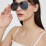 Lifestyle view of Louis Vuitton unisex sunglasses