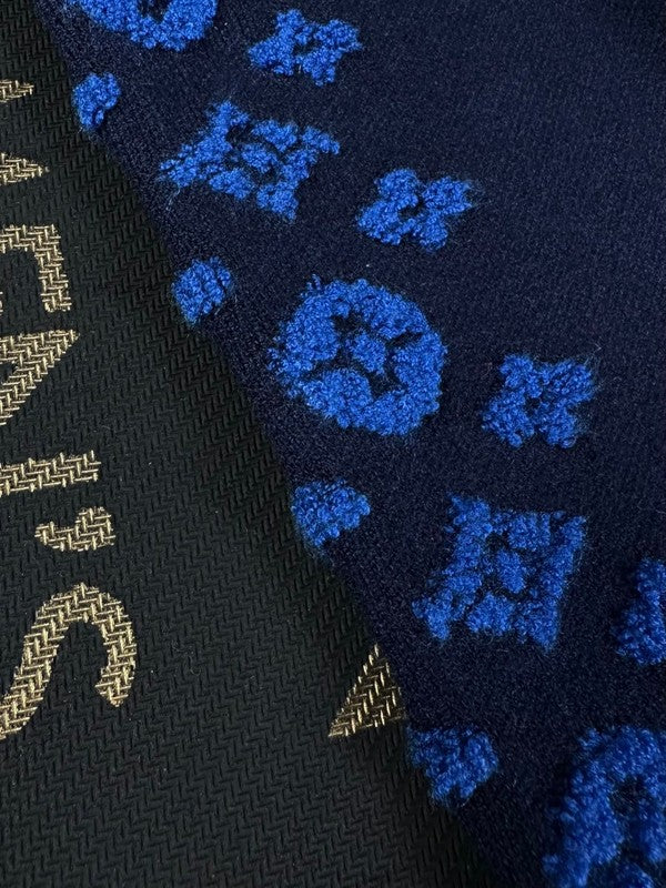 Flat lay presentation of Louis Vuitton luxury clothing with contemporary cut