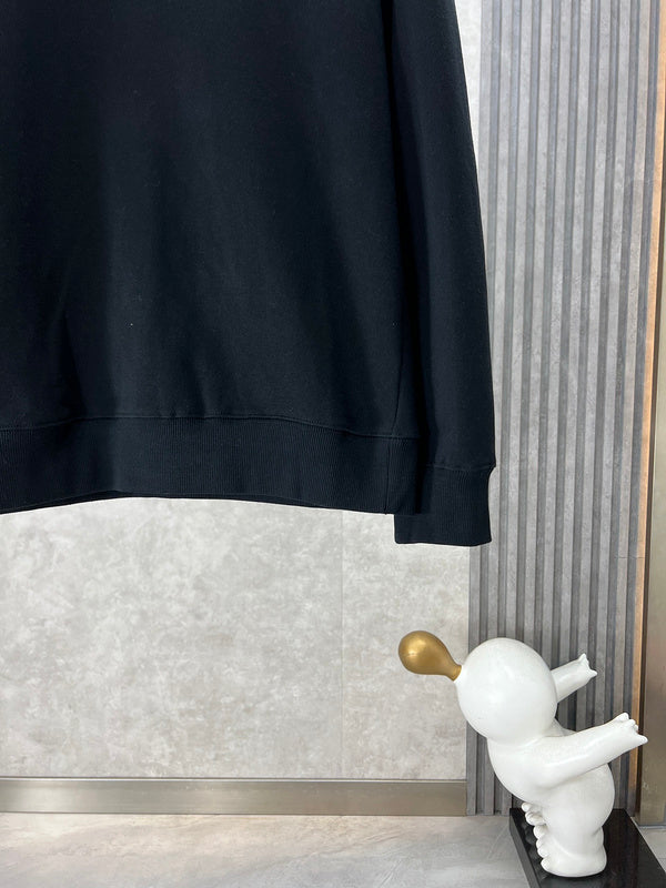 Front view of Louis Vuitton luxury clothing with logo-detail design