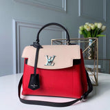 Side profile of chic polished women's handbag – women's statement bag