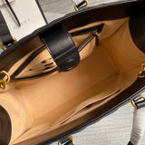 Side profile of structured chic women's handbag – women's luxury accessory