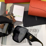 Close-up detail view of Cartier unisex sunglasses