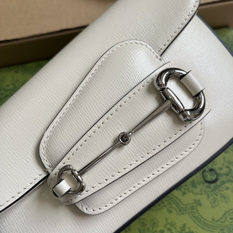 Handle and strap detail of polished refined women's handbag – women's premium purse