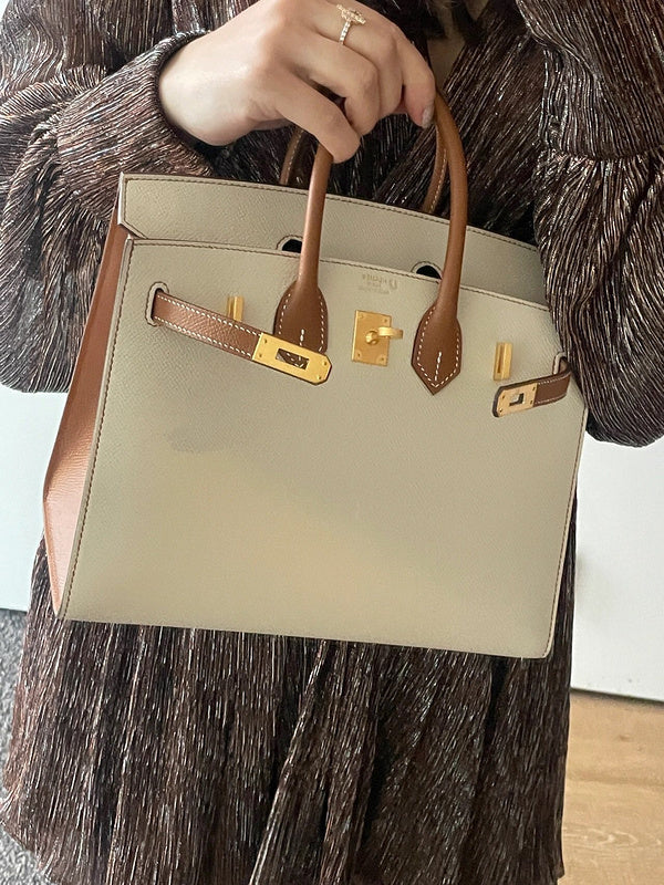 Side view of considered structured handbag