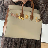 Side view of considered structured handbag