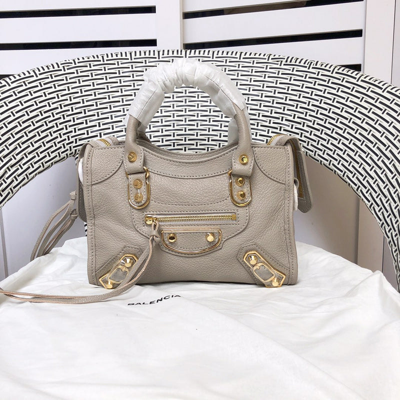 Front view of polished classic women's handbag – women's luxury accessory