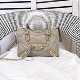 Front view of polished classic women's handbag – women's luxury accessory