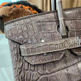 Side view of classic structured handbag