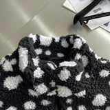 Close-up detail shot of Louis Vuitton luxury clothing with everyday silhouette