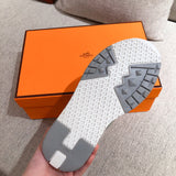 Hermès White High-Top Sneakers - Sole Detail View