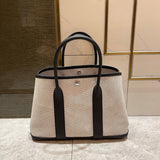 Side view of refined structured handbag