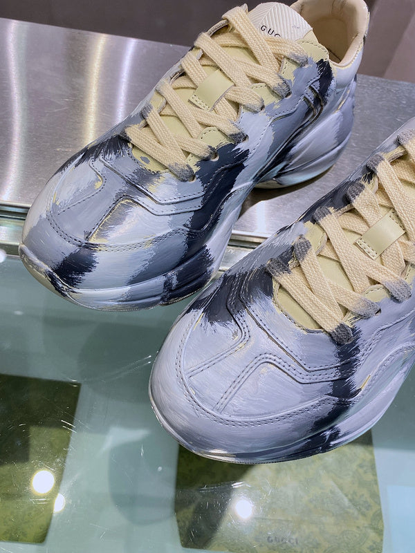 Gucci soft grey luxury sneakers view 9 bold athletic profile