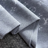 Front view of Louis Vuitton luxury clothing with logo-detail design