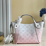 Side profile of signature elevated women's handbag – women's luxury handbag