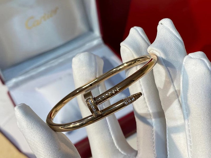 Side view of Cartier unisex jewelry piece