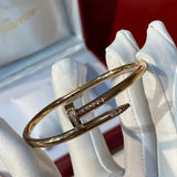 Side view of Cartier unisex jewelry piece