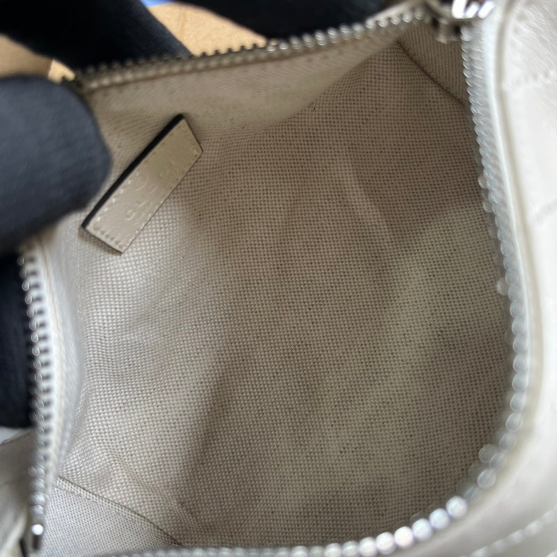 Styled lifestyle shot of everyday-luxe refined women's handbag – women's designer-style accessory