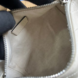 Styled lifestyle shot of everyday-luxe refined women's handbag – women's designer-style accessory