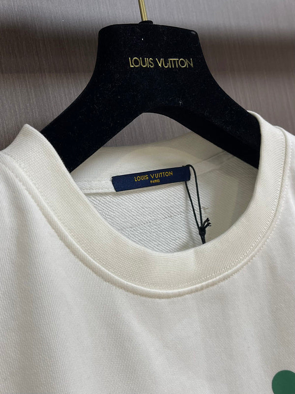 Front view of Louis Vuitton luxury clothing with tailored silhouette