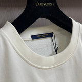 Front view of Louis Vuitton luxury clothing with tailored silhouette