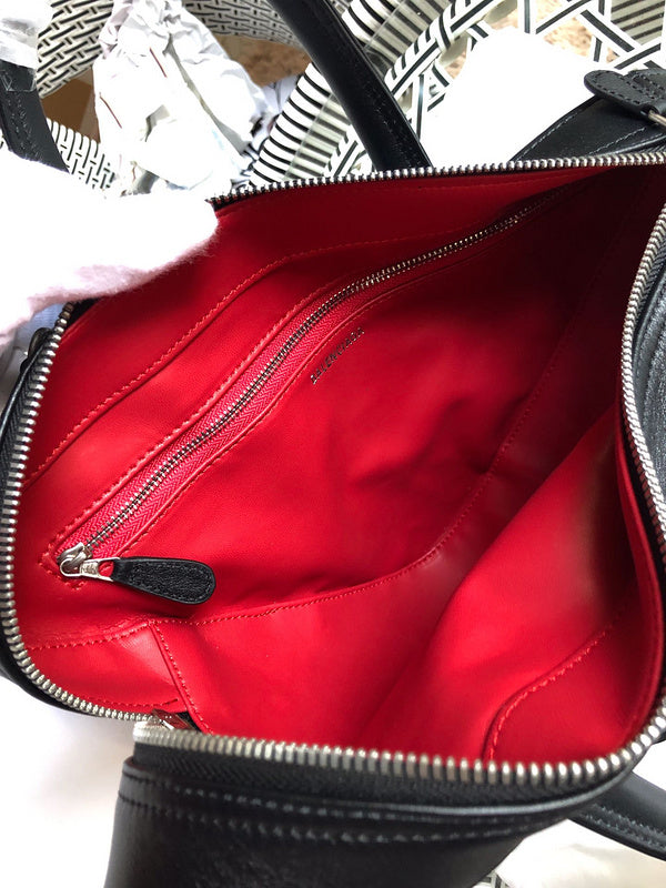 Close-up detail of refined signature women's handbag – women's luxury handbag