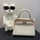  sophisticated top-handle bag styled with outfit