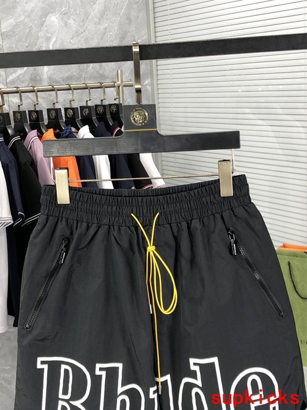 Close-up detail shot of Rhude luxury clothing with logo-detail design
