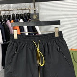 Close-up detail shot of Rhude luxury clothing with logo-detail design