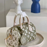 Handle and strap detail of polished chic women's handbag – women's designer-style accessory
